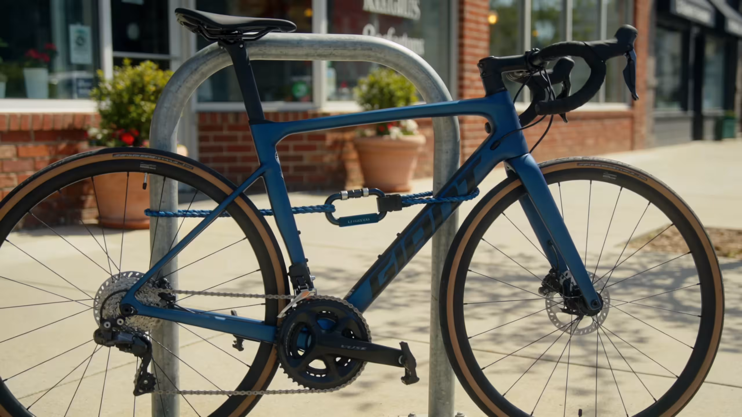 Bicycle locked to outdoor bike rack illustrating renters insurance stolen bike outside coverage