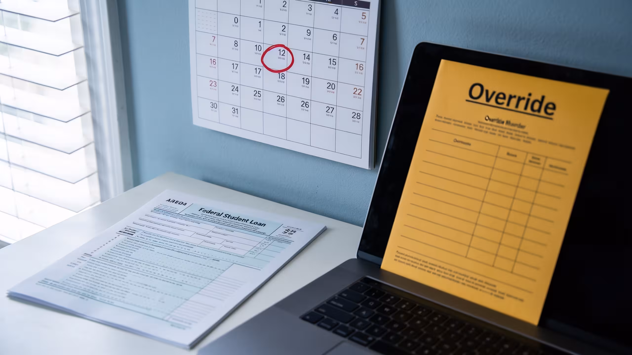 Student loan documents and a calendar with a past-due date, miss a student loan payment on a clean office desk