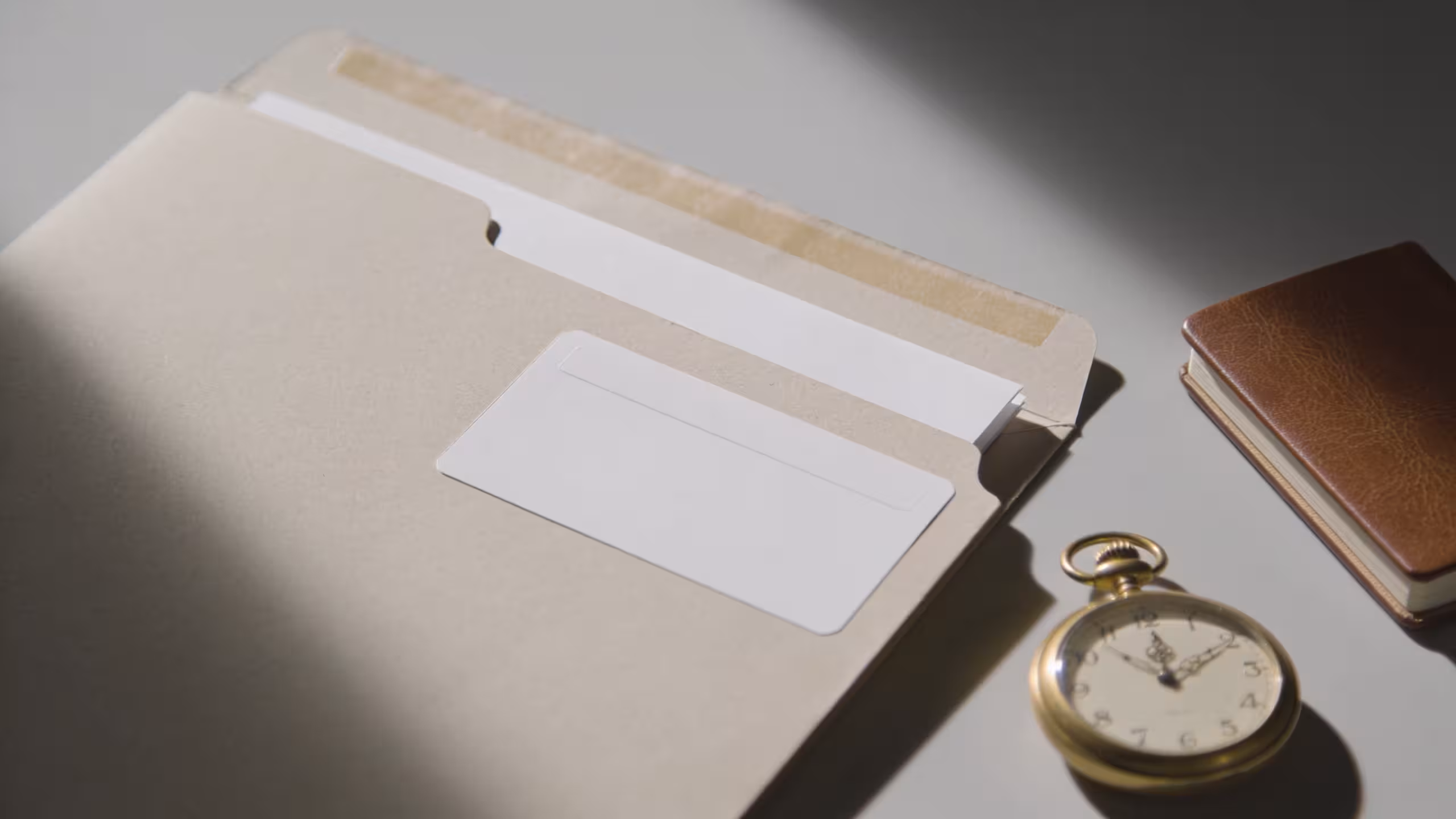 How life insurance beneficiaries work: illustrated with a policy document and family home in soft blue tones