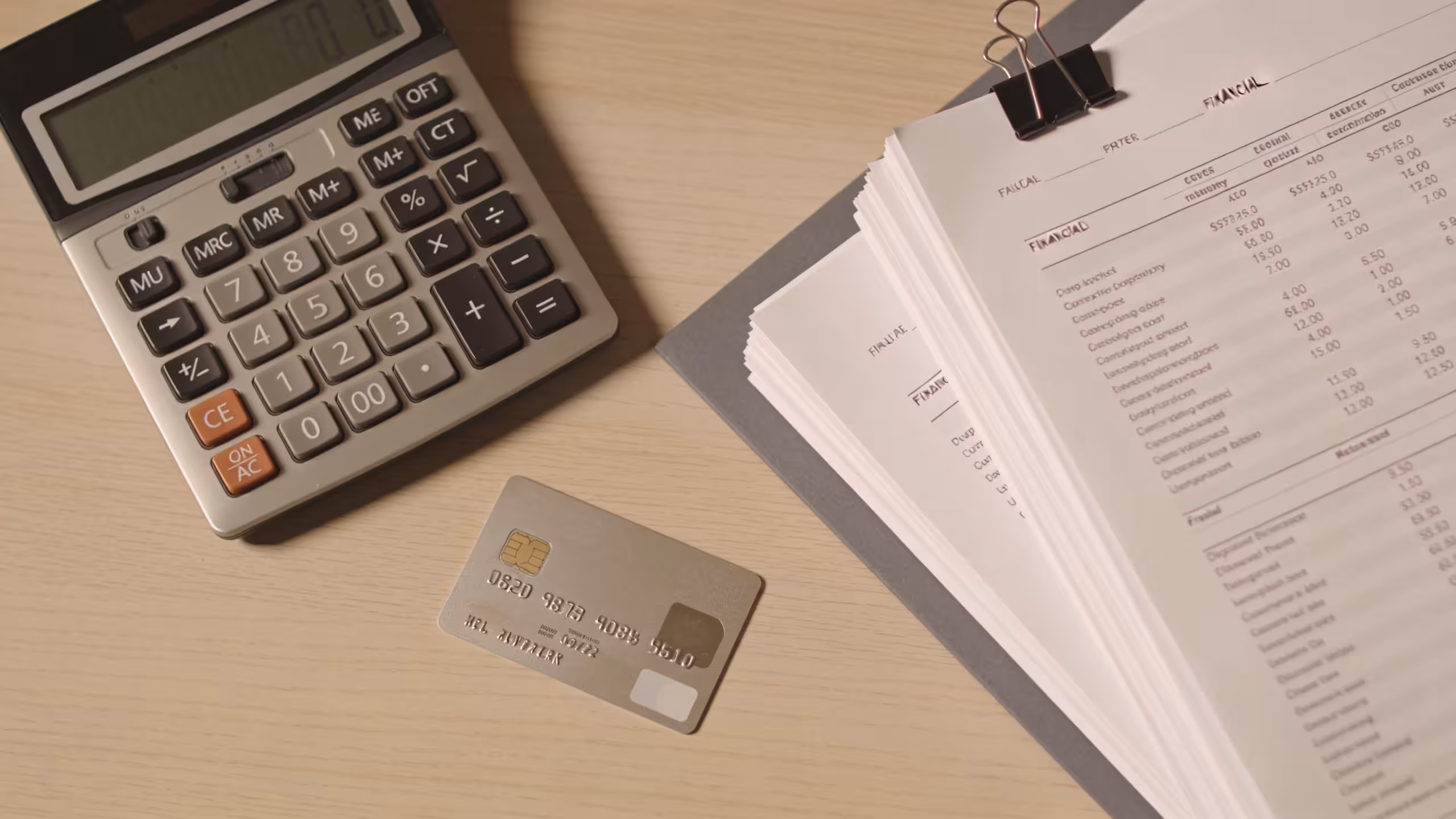 Document folder and pen on a clean desk representing an unsecured personal loan application, editorial style.