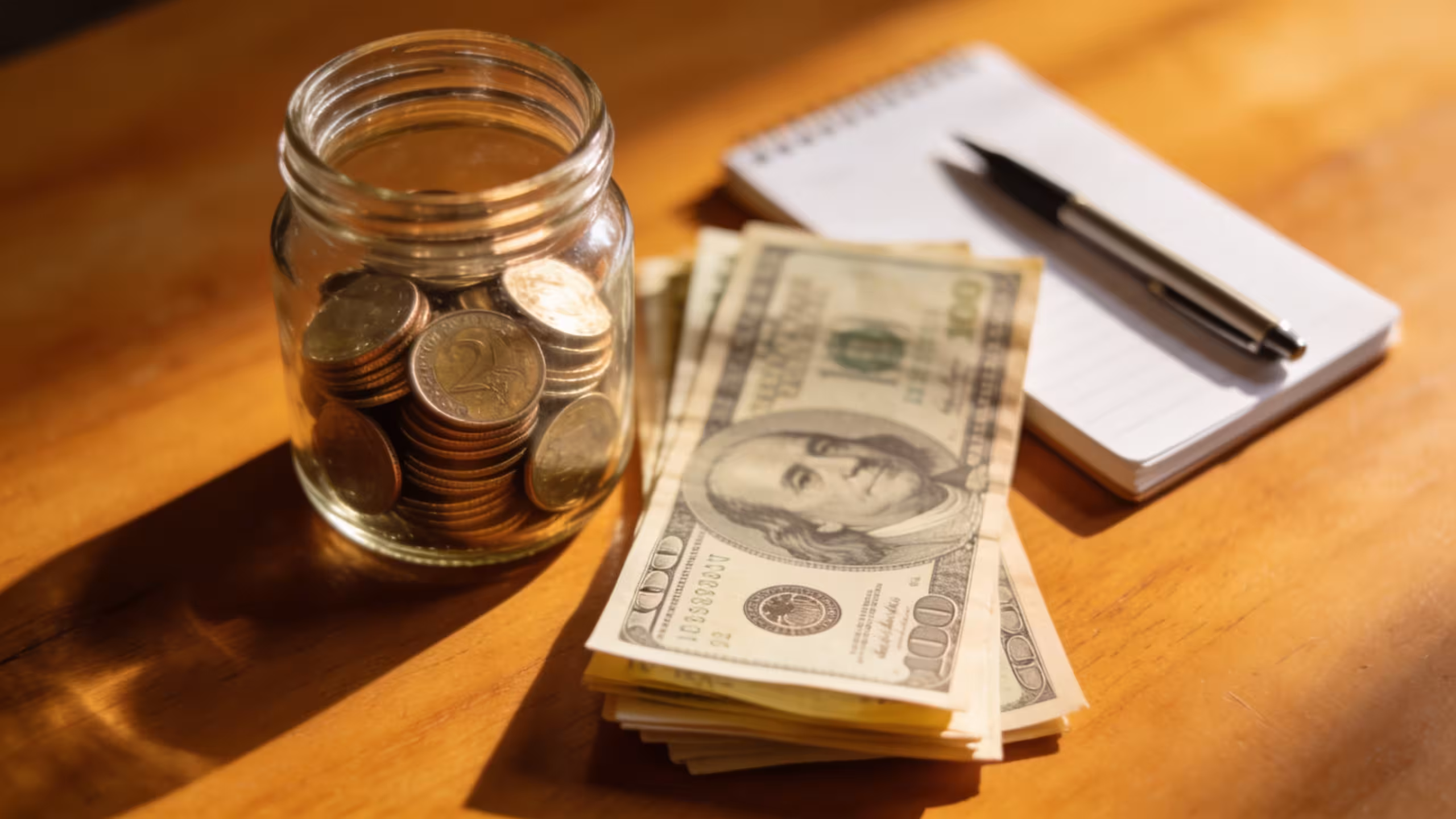 Personal loan for emergency expenses: financial planning documents and currency on a clean desk