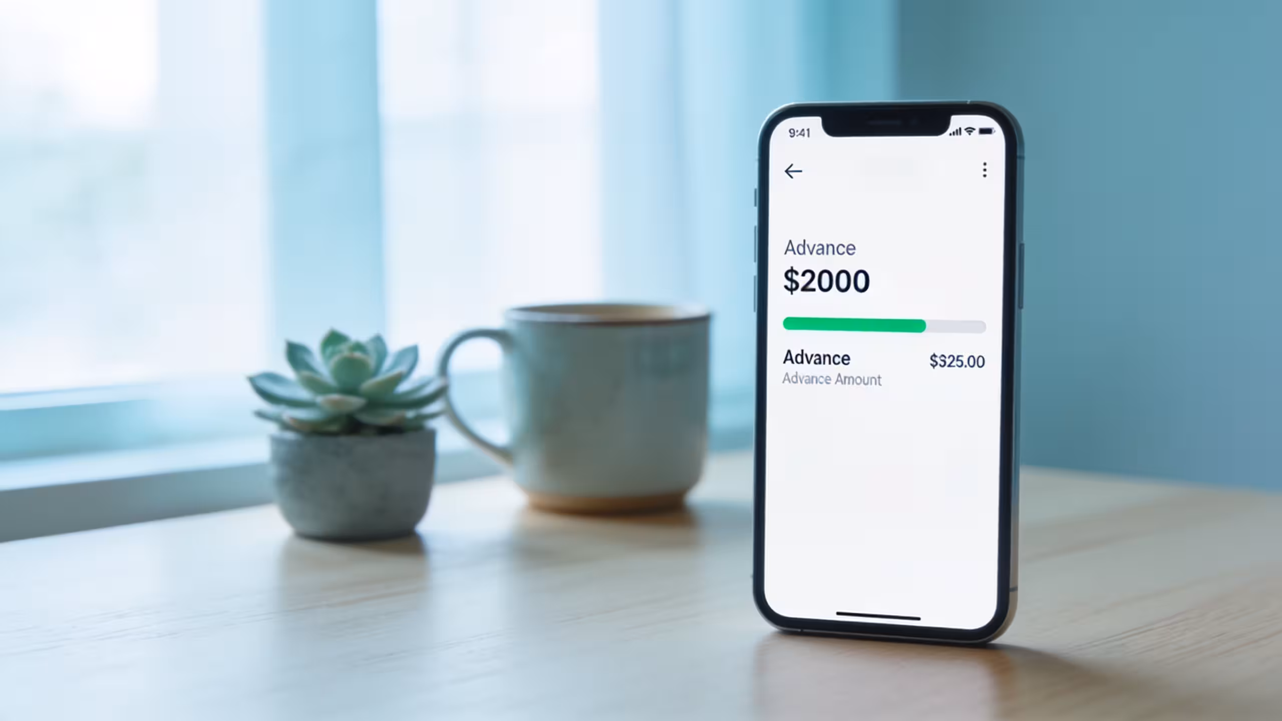 Smartphone displaying a cash advance app interface with available advance amount on a clean desk, illustrating best cash advance apps